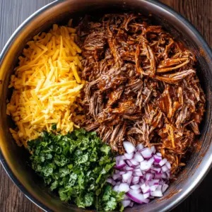 shredded beef coated in a rich, glossy barbecue sauce
