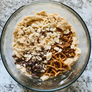 mixing bowl filled with thick cookie dough