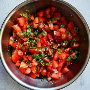 mixing bowl filled with vibrant, freshly diced Campari tomatoes