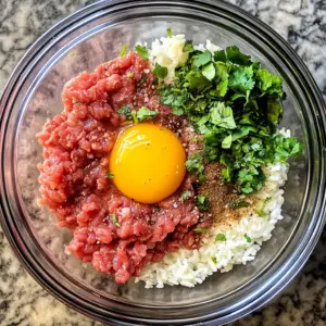 raw ground beef with a rich red color, raw white rice