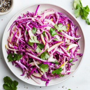 Tangy Apple & Red Cabbage Slaw with a Hot Sauce Kick