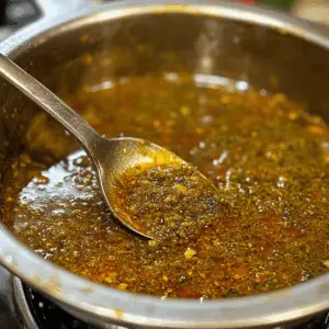 spiced masala is being cooked