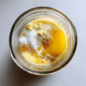 wide-mouth mason jar placed on a light-colored kitchen counter