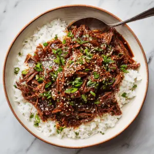 Crockpot Korean Beef with Scallions and Sticky rice