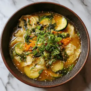 Korean Sujebi Noodle Soup with Perilla Leaves and broth