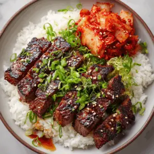 Sizzling Korean BBQ Ribeye with Rice and kimchi